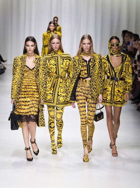 Versace 2018 Spring Summer Womens Runway Catwalk - Milano Moda Donna Milan Fashion Week Italy - Gianni Versace Tribute 1990s 1970s Gold Vogue Mother Mary Cross Baroque American Indian Tresor De La Mer Butterflies Stiletto Pop Art Leopard Crocodile Silk Satin Seashells Starfish Bedazzled Flowers Lace Fringes Cinch Coat Blazerdress Blouse Crop Top Vest Motorcycle Biker Jacket Square Shoulders Denim Jeans Catsuit Leotard Leggings Pleats Swimsuit Sheer High-Low Skirt Bag Fanny Pack Gladiator Boots Vogue Spring, Versace Design, Versace Spring, Denim Jeans Fashion, Fashion Week 2018, Versace Fashion, Rachel Weisz, Donatella Versace, Cindy Crawford