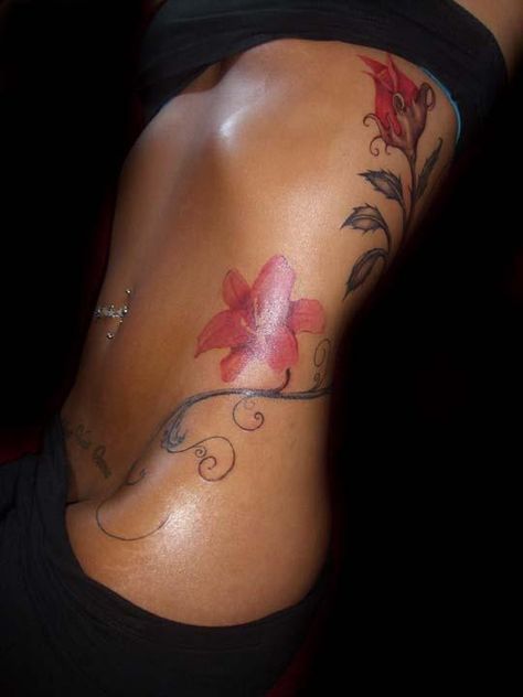 Another pretty flower tat Back Tattoo Women Aesthetic, Duality Tattoo, Front Tattoo, Rib Tattoo Ideas, Flower Tat, Waist Tattoos, Pretty Hand Tattoos, Tasteful Tattoos, Spine Tattoos For Women