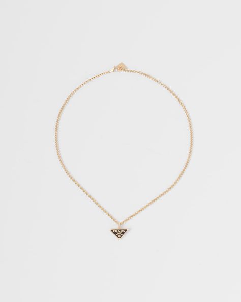 Find PRADA Eternal Gold Pendant Necklace In Yellow Gold With Diamonds on Editorialist. 750 Yellow Gold (18 kt) with diamonds Diamonds: 3 diamonds - Total carats: 0.024 ct - Cut: brilliant - Color: G+ - Clarity: VS+ Pendant with triangle Lobster claw clasp Length 45 cm (17.71 inches) adjustable to 43 cm (16.92 inches) and 41 cm (16.14 inches) Made in Italy Each step of Prada's responsible gold and diamond production chain is verified and traceable thanks to Aura Blockchain technology. Prada Gold Necklace, Prada Jewelry Necklaces, Prada Necklace, Prada Jewelry, Triangle Jewelry, Womens Silver Jewelry, Prada Accessories, Triangle Necklace, Jewelry Lookbook