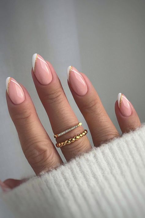 Timeless Glamour: Almond-shaped nails in delicate pale pink embrace sophistication, harmonized with a diagonal white French tip adorned with a touch of gold foil, radiating subtle luxury. // Photo Credit: Instagram @monika__nails Diagonal Nails, Sophisticated Nails, Almond Gel Nails, Natural Nails Manicure, Chic Manicure, Natural Nail Designs, French Manicure Nails, Girly Acrylic Nails, Summery Nails