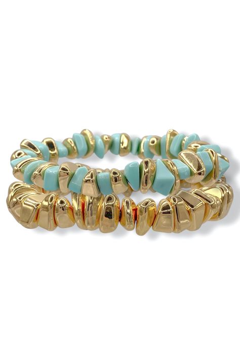 This set features two intricately designed bracelets adorned with multi-geometric shapes. Perfect for those who want to make a statement with their accessories. Diameter: 2.25" Stretch Bracelets Set of 2 Green Beaded Bracelets, Green Ash, Bracelets Set, Green Gold, Stretch Bracelets, Bracelet Set, Green And Gold, Beaded Bracelet, Geometric Shapes