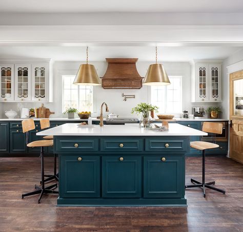 The cabinets have a very traditional style to them, and the painted lower cabinets tie in the more moder element. We chose to paint the upper cabinetry white to keep the boldness of the blue from overpowering the kitchen. The pattern in the glass brings in a little bit of that architectural interest we were looking to add to the home. The finished product is good balance of both traditional and modern. Blue Green Kitchen, Houses Design, Farmhouse Kitchen Remodel, White Kitchen Remodeling, Green Kitchen Cabinets, New Kitchen Cabinets, Classic Kitchen, Kitchen Farmhouse, Kitchen Cabinet Colors