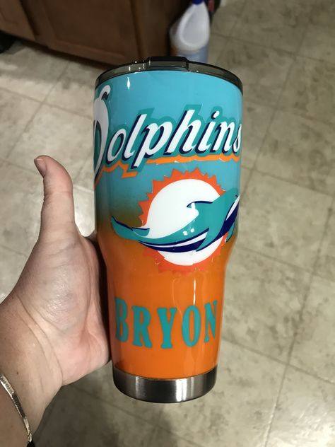 Nfl Epoxy Tumbler Ideas, Miami Dolphins Tumbler Ideas, Nfl Tumblers, Epoxy Tumbler Ideas, Yeti Cup Designs, Heaven Tattoos, Dolphin Coloring Pages, Yeti Cups, Fundraiser Ideas