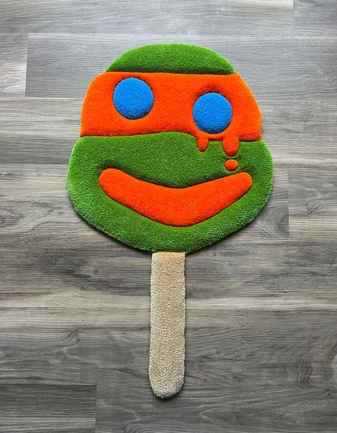 Handmade custom tufted Michelangelo Ice Cream! Made To Orders take about 7-14 days to be made and shipped out depending on size! Each tufted rug is carefully crafted and carved to perfection giving an almost 3D appearance that you can see and feel. Each piece is a luxury decor addition to the interior floors of your home.  Also an amazing gift for your family or friends! I specialize in creating custom rugs from any design such as Business logos, Faces, Animals, Etc. via photos and I also offer Weird Furniture, Make Your Dreams A Reality, Graphic Rug, Funky Rugs, Future Apartment Decor, Rug Inspiration, Business Logos, Cute Bedroom Decor, Apartment Decor Inspiration