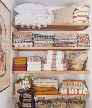 Organized Linen Closets | Hunker Cabinet Trends, Organizing Linens, Renovation Tips, Laundry Room Renovation, Open Closet, Linen Closet Organization, Colorful Kitchen, Laundry Room Storage, Room Renovation