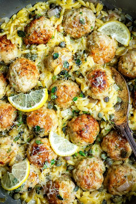 Chicken Piccata Meatballs with orzo – this delicious chicken meatball recipe will tantalize your taste buds with its zesty lemon caper sauce!! Chicken Meatball Sauce, Chicken Meatballs With Orzo, Chicken Piccata Meatballs, Chicken Meatball Recipe, Baked Chicken Meatballs, Lemon Caper Sauce, Chicken Piccata Recipe, Meatball Dinner, Chicken Meatball