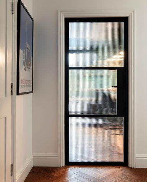 An internal steel look door with fluted glass.

Whether its a single steel look door leading to a utility, or wide double doors in the hallway, we can create the perfect look for your home.⁠
⁠ Ribbed Glass Pocket Door, Fluted Door Design, Fluted Glass Sliding Door, Fluted Window, Reeded Glass Door, Fluted Glass Door, Glass Pocket Door, Timber Front Door, Sliding Doors Internal