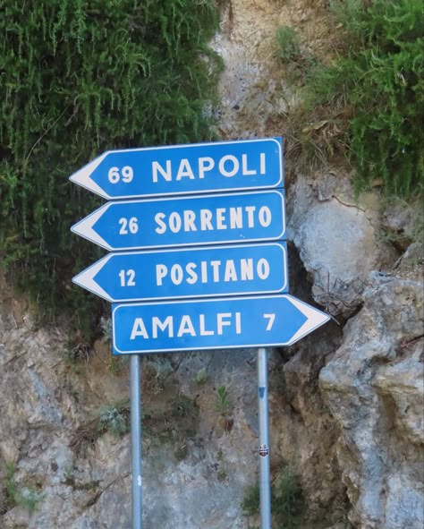 Blue Sign with white lettering and arrows point to the direction and distance to Napoli, Sorrento, Positano and Amalfi in Italy. Positano Inspo Pics, South Of Italy Aesthetic, Napoli Quotes, South Italy Aesthetic, Italian Beach Aesthetic, Sorrento Poster, Sorrento Aesthetic, Sorrento Italy Aesthetic, Capri Italy Aesthetic