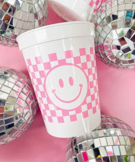 Bring on the fun with these checkered smiley face stadium cups. Perfect for a 21st birthday celebration or bachelorette party! Set of 6 16oz white stadium cups Pink printing Double-sided Reusable Made in the US Pink Checkered Birthday Party, Pink Smiley Face Party, Pink Smiley Face Birthday Party, Checkered Birthday Party, Smiley Birthday Party, Happy Face Birthday Party, Preppy Party Decorations, Smiley Face Birthday Party, Smiley Birthday