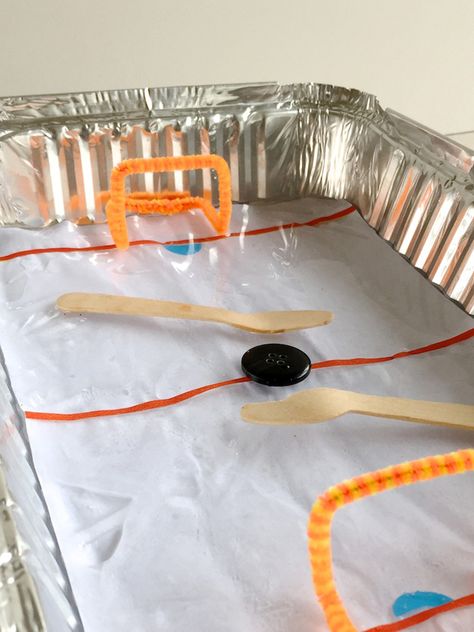 Build your own tabletop ice hockey rink! Ice Hockey Rink, Hockey Crafts, Diy Tabletop, Olympic Crafts, Handmade Charlotte, Sport Craft, Winter Preschool, Popsicle Sticks, Winter Fun