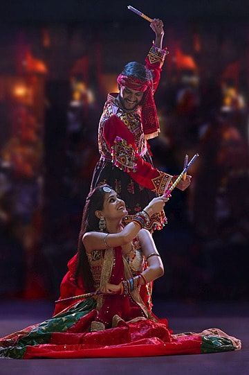 hinduism,husband,arts,motion,lifestyle,male,mudra,female,indoor,couple,side,traditional,twopersons,performance,positive,maang,dance,wife,occasion,arms,bangles,asian,gujrat,event,happiness,performing,costume,stage,confidence,enjoyment,dancer,raised,bonding,performer,holding,celebration,turban,form,femininity,jewellery,sticks,dandiya,man,gujrati,togetherness,vertical,cheerful,woman,indian,years,emotion,coloured,festival,navratri,and,facial,tikka,clothing,hair,garba,ethnicity,25-30,multi,culture,lo Garba Photo, Arts Picture, Arm Bangles, Stage Photo, Logo Cloud, Fall Music, Black And White Tree, Color Festival, Business Card Branding