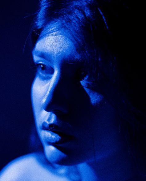 Blue portrait photography of close up female face Cool Tone Portrait, Colored Light Portrait Photography, Blue And Yellow Lighting Photography, Blue Self Portrait, Blue Light Photography Portraits, Blue Tint Photography, Blue Toned Photography, Blue Light Reference, Blue Photography Portrait