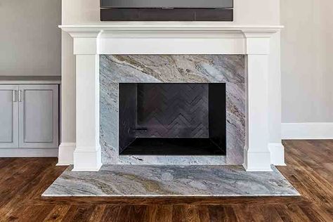 Fantasy Blue Granite Surround Fireplace, Granite Around Fireplace, Fireplace With Granite Surround, Granite Fireplace Hearth, Quartzite Fireplace, Granite Fireplace Surround, Fireplace Molding, Rustic Hardwood Floors, Granite Hearth