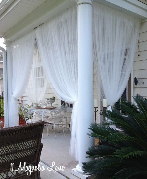 Inexpensive sheer curtain panels from Ikea (Lill) are used to create a "screened" porch from a covered porch.  Read the how-to's at 11 Magnolia Lane. Diy Screened Porch, Screened In Porch Diy, Small Pergola, Military Housing, Porch Curtains, Casa Exterior, Rental Decorating, Diy Deck, Have Inspiration