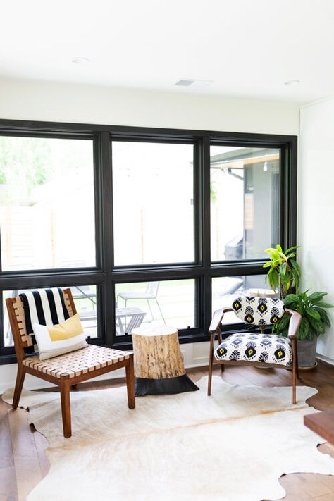 Thinking about Ideas for black window trim? See Tricorn Black on interior windows and doors. Sherwin Williams to the rescue- Tricorn black works in all spaces. Painted Black Window Trim, Interior Black Window Trim, Painting Interior Windows Black, Black Trim Windows Interior Living Rooms, Black Interior Windows With Black Trim, Black Interior Window Trim, Black Painted Window Trim, Black Windows And Trim, White Walls Black Windows