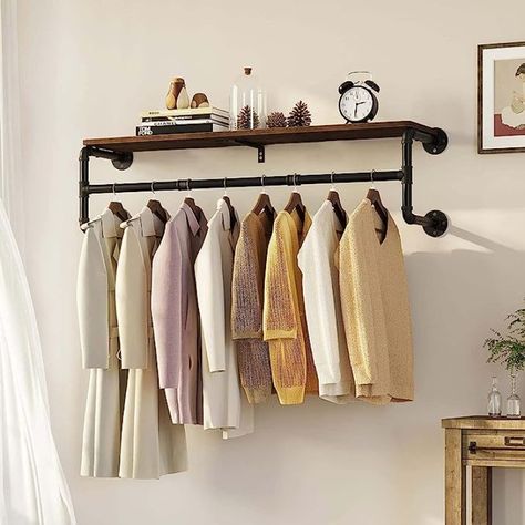 About this item
►Large Storage Space with Shelf - Wall mounted industrial clothing rack, made from 2.5cm diameter steel pipe with a width of 100 cm. This retro clothes rail can hold many clothes with 30kg/66lbs weight capacity. This coat rack features a shelf perfect for holding your collectibles, photo frames, statues, small vases or accent pieces. While the clothing rail can be used for hanging your keys, umbrellas, coats, hats or scarves.
►Multifunction - Innovative storage and hanging space combined, this hanging clothes rails aimed to create a bespoke space wherever you need to hang, store or display. This retro style is perfect for home, any retail space from shops, storerooms and kitchens to small alcoves and cupboards to help you make the most of your space, providing a durable, st Industrial Clothing Rack, Pipe Clothes Rack, Hanging Clothes Rail, Hanging Coat Rack, Hanging Clothes Racks, Space Saving Hangers, Garment Rack, Clothes Rail, Industrial Pipe