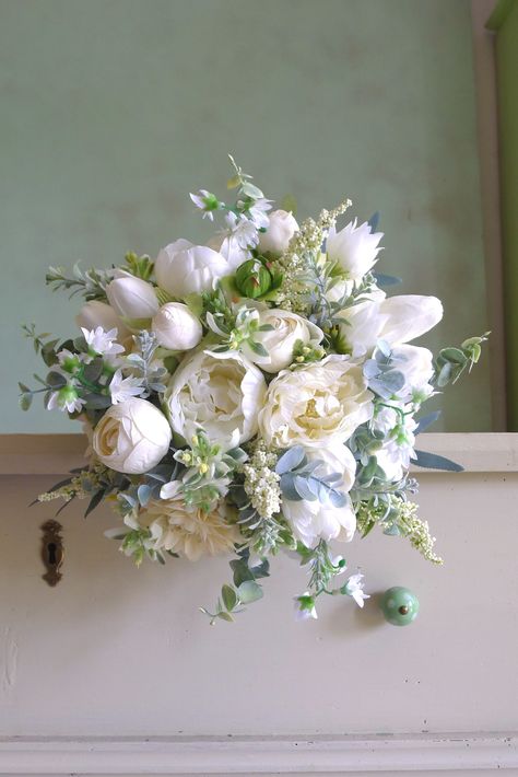 An elegant wedding bouquet in an immortal white-cream combination is made of textile flowers of dahlias, spiers, peonies, tulips and milkweeds. All flowers are carefully selected to look as alive. Peonies And Lavender Bouquet, Wedding Bouquets Bride Peonies, Romantic Wedding Bouquet Vintage, Wedding Florals Peonies, Flowy Wedding Bouquets, Clean Wedding Bouquet, Wedding Flower Arrangements Peonies, Bridal Bouquet Flower Types, Muted Pastel Wedding Flowers