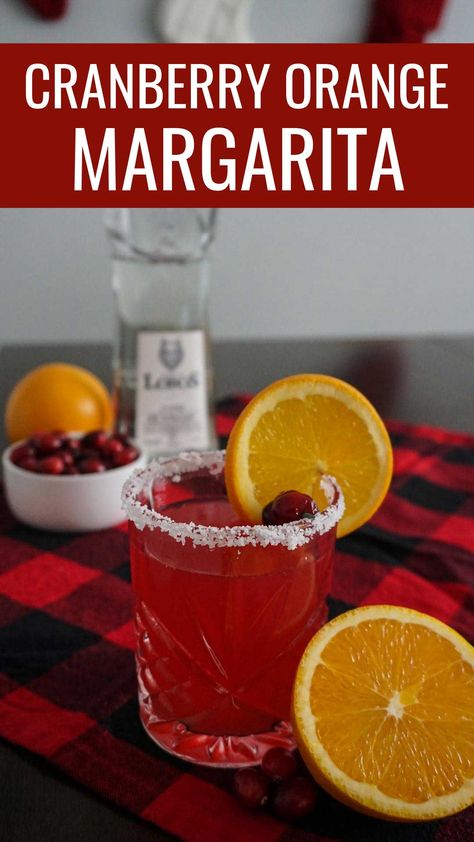 #ad These Cranberry Orange Margaritas combine Lobos 1707 Tequila, Joven with orange liqueur, tart cranberry juice, and freshly squeezed lime and orange juices for a festive fall to winter cocktail. Garnished with fresh cranberries, this margarita can be served on Thanksgiving, Christmas, or New Year's Eve! #Lobos1707 #DrinkResponsibly #AllForThePack #WelcomeToThePack | Holiday cocktail | Cranberry Orange Margarita recipe | Christmas margarita | Cocktail recipe | Tequila cocktail | Drink recipe Cranberry Juice Cocktail Recipe, Cranberry Margaritas For A Crowd, Cranberry Garnish For Drinks, Christmas Cocktail With Tequila, Batch Cranberry Margarita, Cranberry Drinks Alcohol Thanksgiving, Holiday Cocktails With Tequila, Thanksgiving Cranberry Cocktail, Tequila Cranberry Drinks