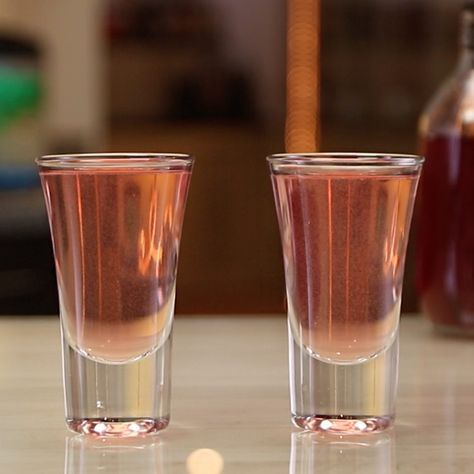 WOO WOO SHOT 1 oz. (30ml) Vodka 1/2 oz. (15ml) Peach Schnapps 1/2 oz (15ml) Cranberry Juice PREPARATION 1. Combine vodka, peach schnapps, and cranberry juice in a shaker with ice. Shake well. 2. Strain mix into a shot glass. DRINK RESPONSIBLY! Peach Schnapps Shots, Shots With Peach Schnapps, Bartender Recipes, Strawberry Cocktail, Pickle Vodka, Shooter Recipes, Summertime Wedding, Shots Alcohol, Glass Drink