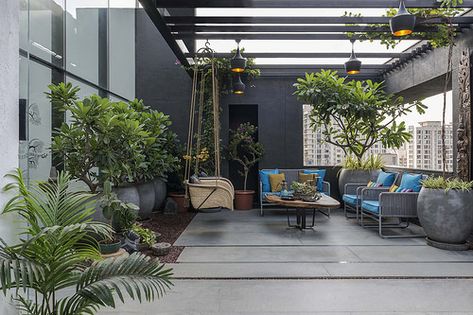 The terrace. A Sprawling Penthouse in Mumbai With Hidden Doors & a Stairway to Green Heaven Mumbai Penthouse, Open Terrace Ideas, Veranda Design, Terrace Garden Ideas, Interior Design Blogs, Terrasse Design, Balcony Design Ideas, Terrace Garden Design, Building A Porch