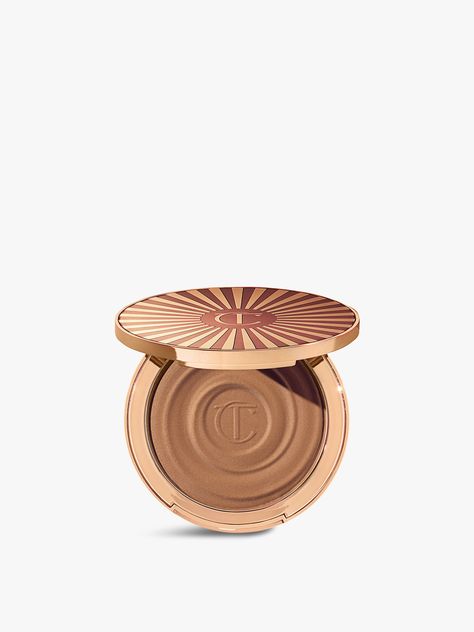 Introducing the Charlotte Tilbury Beautiful Skin Bronzer. Get That Summer Glow Look And Feeling With The Beautiful Skin Sun-Kissed Glow Bronzer! This Cream Bronzer Blurs, Hydrates And Adds A Wash Of Sun-Kissed Colour To Your Complexion, While Improving The Look Of Your Skin Every Time You Wear It! Enriched With Hyaluronic Acid And Sunshine Provitamin D3, This Cream Bronzer Is The Secret To Instant Sun-Kissed Skin And A Beautiful, Healthy-Looking, Beachy Bronzed Glow Everyday! Formula: Cream Charlotte Tilbury Beautiful Skin, Cream Bronzer, Charlotte Tilbury Makeup, Xmas Wishes, Too Faced Bronzer, Makeup Must Haves, Makeup Bronzer, Summer Glow, Makeup Items