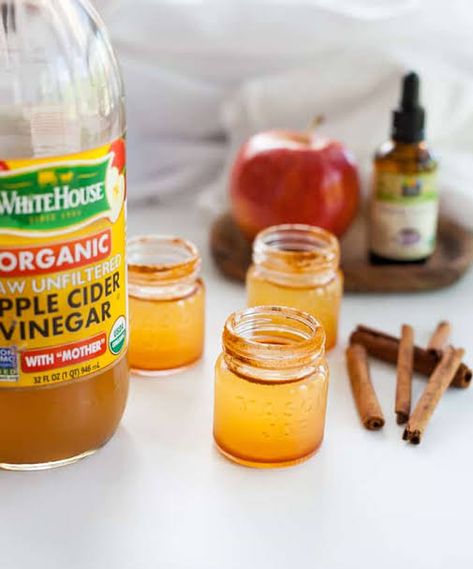 There are so many foods that are so good for us but taste so bad! Apple cider vinegar is one of those drinks that has incredible benefits if consumed on a daily basis, but man, it's hard to drink, am I right? My dilemma is that when the ACV is diluted with a large amount of liquid, it is easier to handle, but who wants to drink an entire glass of bland vinegar? #applecider #drinks Apple Cider Vinegar Shots Recipe, Apple Cider Vinegar Shot, Cider Drink Recipes, Apple Pie Drink, Apple Cider Recipes, Recipe Apple Pie, Cocktail With Vodka, Mudslide Recipe, Apple Cider Vinegar Supplements