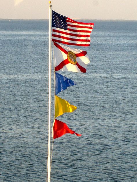 Nautical flags as seen from the Columbia restaurant at the St. Pete pier, via Flickr. St Pete Pier, Coast Guard Wife, Nautical Outdoor Decor, Crab Party, Columbia Restaurant, Themed Rooms, Signal Flags, American Summer, Nautical Flags