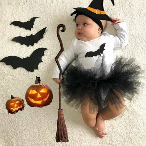 Happy spooky season! Make this year extra special as new parents with these easy and cute Halloween photoshoot ideas for babies. Baby Girl Halloween Photoshooting Ideas, Baby Witch Photoshoot, Cute Halloween Photoshoot Ideas, Halloween Monthly Baby Pictures, Halloween Baby Photoshoot Ideas, Cute Halloween Photoshoot, Halloween Photoshoot Kids, October Baby Photoshoot, Newborn Halloween Photoshoot