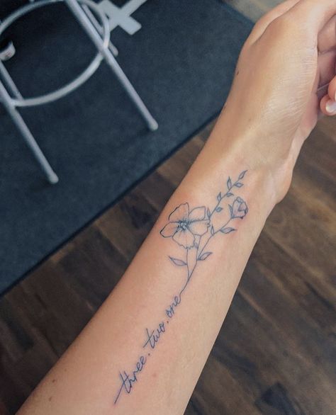 Tattoo With Writing And Flowers, See The Good Tattoo With Flower, Quote In Flower Tattoo, Simple Flower Tattoo With Words, Flower Stem Into Words Tattoo, Flower Tattoo Words As Stem, Floral Tattoo Design With Words, Flower Stem Quote Tattoo, Writing Tattoos With Flowers