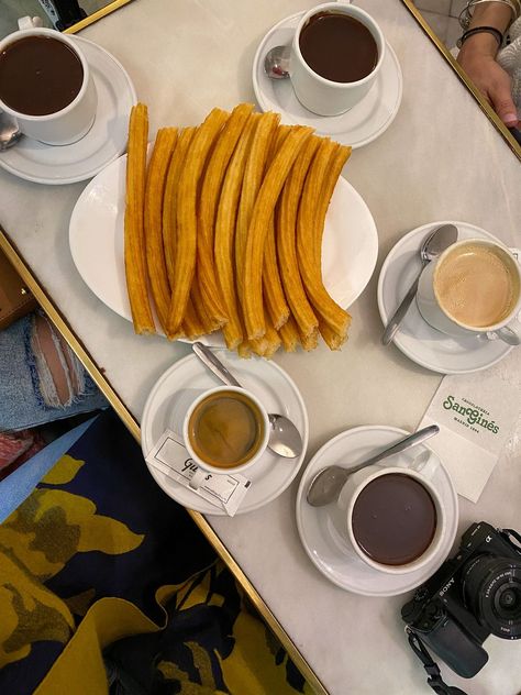 Chocolate and Churros at San Gines | Photos to Inspire You to Visit Spain | European Vacation Inspiration | Spain Travel | Spain Aesthetics | Spain Aesthetic | Most Beautiful Places in Spain | Best Places to Visit in Spain | Famous Madrid Landmarks Living In Madrid Aesthetic, Madrid In November, Espana Aesthetic, Madrid Spain Aesthetic, Food In Spain, Spain Lifestyle, Madrid Pictures, Spain Aesthetics, Beautiful Places In Spain