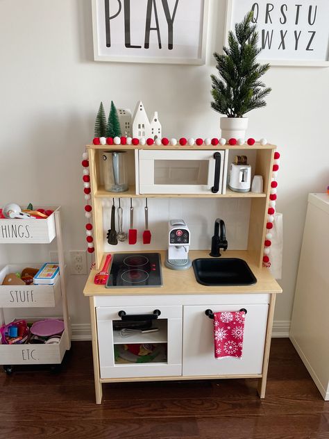 Christmas Play Kitchen, Christmas Play Kitchen Decor, Play Kitchen Holiday Decor, Customized Ikea Play Kitchen, Red Play Kitchen, Toddler Play Kitchen Target, Christmas Kids Room, Christmas Doll House Pottery Barn Kids, Ikea Play