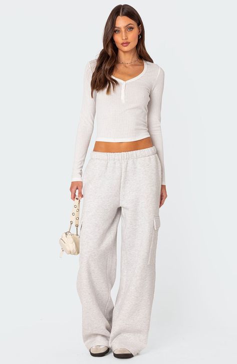 Lounge or go out in comfy fleece sweatpants made with cargo pockets and full-length wide legs for trend-right updates. Elastic waist Side-seam pockets; back patch pockets; cargo flap-patch pockets 100% cotton Machine wash, dry flat Imported Pointelle Fabric, Pointelle Top, Oversized Sweatpants, Cargo Sweatpants, Wide Leg Sweatpants, Swimwear Dress, Fleece Sweatpants, Cargo Style, Bottom Clothes