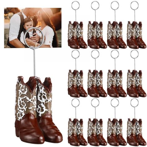 PRICES MAY VARY. Sufficient Quantity: 12 pieces of cowboy boots picture holders in western style, and they are so cute and vivid; The quantity is adequate for your reception table use and daily needs; You don't have to worry about the problem of no replacement Attractive and Exquisite Design: these cowboy boots table number holders have simple and exquisite design, hand painted with patterns, you can also see some wrinkles on the surface, realistic and vintage, adding a sense of beauty; You can Cowboy Theme Party Decorations, Western Bridal Showers, Cowboy Themed Birthday Party, Rodeo Baby, Boots Photo, Cowboy Theme Party, Cute Table, Wedding Anniversary Decorations, Cowboy Baby Shower