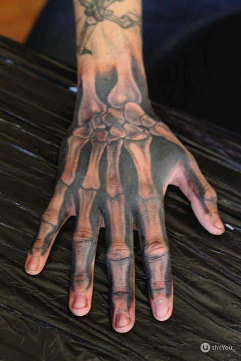 Skeleton tattoos have been around for a very long time, but few people really understand what they mean. We have painted all the options in our article, and the icing on the cake is the 50 best ideas to ink. Bone Hand Tattoo, Skeleton Hand Tattoos, Arm Tattoos For Guys Forearm, Best Neck Tattoos, Smile Tattoo, Bone Hand, Skull Hand Tattoo, Skeleton Tattoo, Rose Tattoos For Men