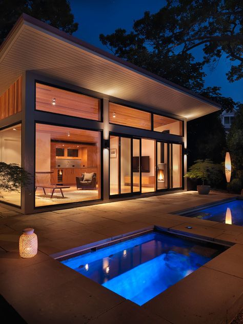 This modern guest house has a sloped roof with plenty of glass windows, which are a strong contrast to the original shingle style home on the property. Backyard Pool House, Pool House Design, Pool Guest House, Modern Pool House, Backyard Guest Houses, Guest House Plans, House With Pool, Relaxation Tips, Pool House Designs