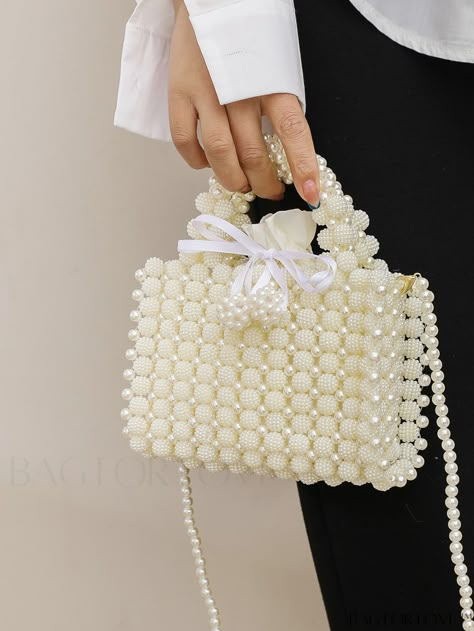 BagForLove - Faux Pearl Decor Shoulder Bag - Mini Drawstring Square Design Product Description Color White Details Pearls Type Square Bag Bag Size Mini Closure Type Drawstring Style Fashionable Pattern Type Plain Features High-capacity Material Polyresin Size Chart INCH CM Strap Length Bag Length Bag Width Bag Height Handle Height 43.3 inch 7.5 inch 2.8 inch 5.1 inch 7.1 inch Strap Length Bag Length Bag Width Bag Height Handle Height 110 cm 19 cm 7 cm 13 cm 18 cm Details Pictures Similar Product Wedding Columns, Pearl Clutch Bag, Hand Beaded Bag, Pearl Clutch, Pearl Decor, Pearl Bag, Stylish Handbags, Fancy Bags, Beaded Bracelet Patterns