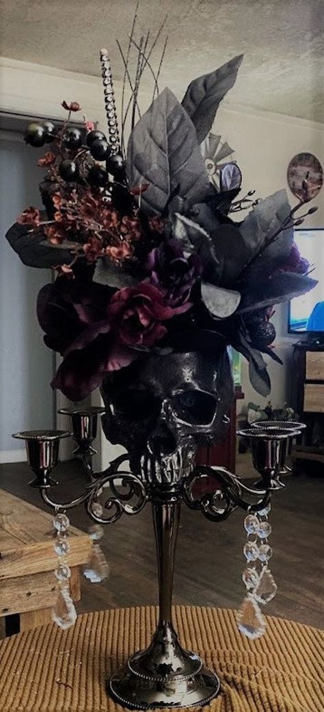 If you love gothic and you want something made special contact me.  This is some Candelabra's decor I made.  I am available to take special request and create your wedding decor too.  Everything was made by design.  I love making unique wedding bouquets and decor to fit the bride's dream for her wedding day. I will take special orders for theme, color, shape and style.    Pricing is for this centerpiece with variations.  Price will change depending on what you would like and the changes you make Natal, Skull Centerpiece, Dark Romantic Wedding, Gothic Wedding Theme, Vampire Wedding, Dark Wedding Theme, Unique Wedding Bouquet, Halloween Themed Wedding, Wedding Centrepieces