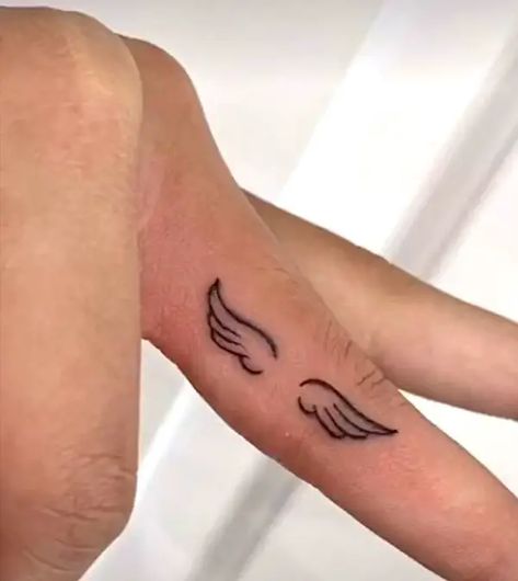 Angel Wings Finger Tattoo, Tattoos Angel Numbers, Men Finger Tattoos, Angel Wing Finger Tattoo, Wing Tattoos On Wrist, Side Finger Tattoos, Inside Finger Tattoos, Small Angel Wing Tattoo, Friends Tattoos