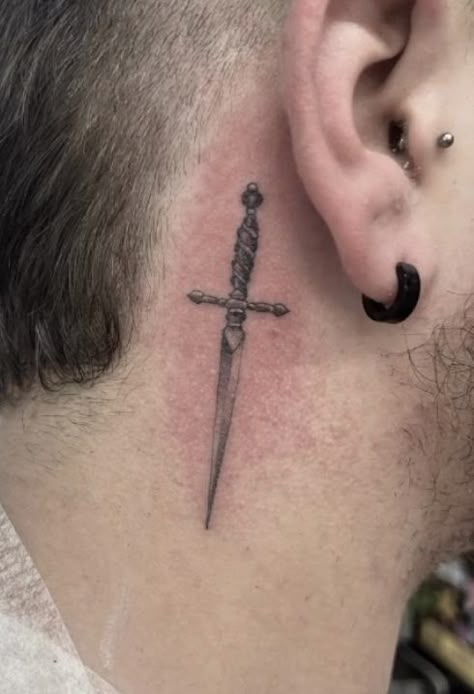 Done by @ rossnagle in allstar tattoo, Limerick, Ireland Single needle, realism, black and grey, dagger / sword Knife Neck Tattoo, Small Swords Neck Tattoo, Dagger Tattoo Behind Ear, Men’s Tattoo Behind Ear, Dagger Tattoo Men, Behind The Ear Tattoo Ideas For Men, Simple Dagger Tattoo, Behind Ear Tattoo Men, Tattoos Best Friend