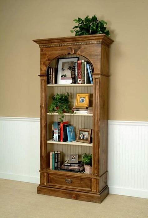 This elegant bookcase features an open display with a beadboard interior back, three adjustable shelves, and a drawer equipped with wooden glides. You can also opt for the RB76D-Regency Bookcase with a door. The exterior measures 36 inches wide, 76.25 inches high, and 15.75 inches deep, while the interior dimensions for the top section are 23.25 inches wide, 55.5 inches high, and 11.75 inches deep. The drawer measures 22 inches wide, 5.25 inches high, and 10.25 inches deep. The finish shown is Group #02, featuring a dark walnut exterior with a parchment interior and shelves. It comes standard with an antique Victorian brass handle. Available in standard sizes, you can choose between standard or light distressing for a personalized touch. Vintage Bookshelf Ideas, Ornate Bookshelf, Bookshelves Antique, Antique Room Ideas, Antique Book Shelf, Victorian Bookshelf, Bookshelf Antique, Antique Shelving, Vintage Bookshelves