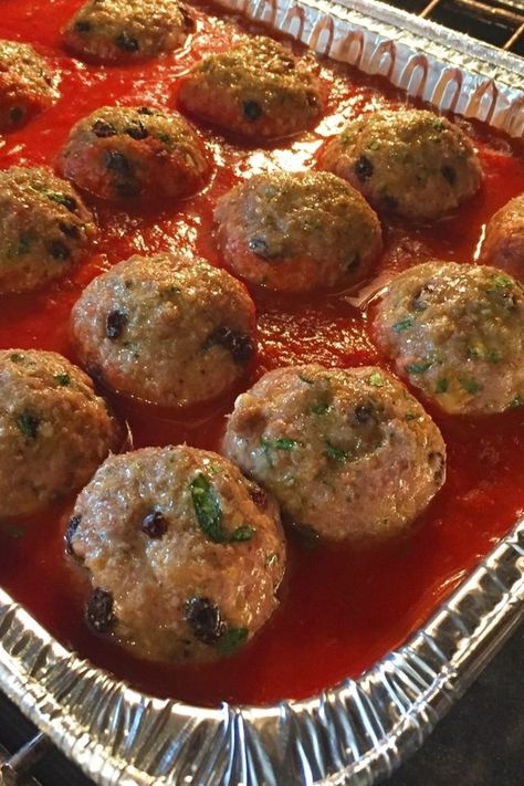 A little different than traditional Italian meatballs, Sicilian Meatballs with pine nuts and currants bake in a basil marinara sauce. Make this delicious meatball recipe in mini meatballs and serve as a Christmas appetizer. They will be your new favorite meatball! #christmasappetizerrecipe #meatballrecipe Sicilian Meatballs Recipe, Basil Marinara Sauce, Sicilian Meatballs, Best Italian Meatball Recipe, Easy Italian Meatballs, Meatballs Recipes, Italian Meatballs Recipe, Favorite Christmas Recipes, Meatball Recipes Easy