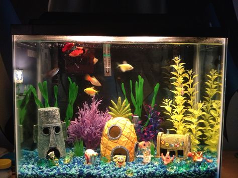 My son's Sponge Bob inspired fish tank Spongebob Fish Tank Ideas, Fake Fish Tank Diy, Aquarium Stones Decoration, Spongebob Aquarium Ideas, Fish Tank Ideas Aesthetic, Glofish Tank Ideas, Fish Tank For Kids, Spongebob Fish Tank, Kids Aquarium