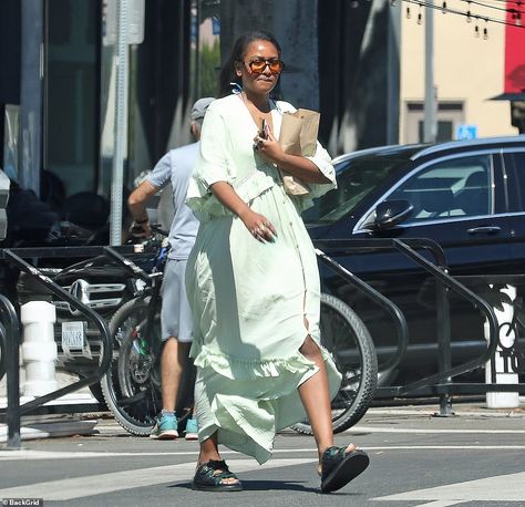 Sasha and Malia Obama wear green outfits to run errands in LA Sasha And Malia Obama, Pale Green Dress, Obama Daughter, Sasha Obama, Malia Obama, Long Jean Shorts, Long Denim Shorts, Dad Sandals, Green Outfits