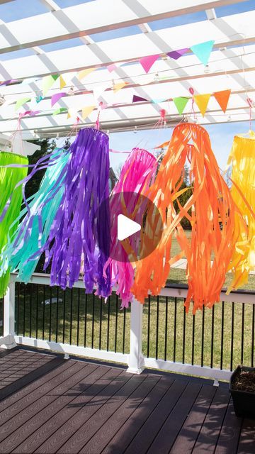 Mitesh | Home & Design on Instagram: "Sharing a cheap an easy decor idea for your Holi party. I used plastic table covers and 10” embroidery hoops to create these hanging pieces. I grouped various colors together just like the colors of Holi. Each table cover is enough for a 9 or 10” embroidery hoop and I used both inner and outer hoop to create 2. I then tied some yarn to create hangers and they were ready to go. The wind picked up and the last shot just feels like a party. These are waterproof and store easily so will definitely be bringing them out each year. . The felt pennant banner is from Amazon. I was going to DIY this but was much cheaper and better readymade. . Table covers @partycity  Embroidery Hoops @michaelsstores  . . . . . . . . . #holidecor #holi #holidecoration #holifesti Holi Party, Holi Festival Of Colours, Easy Decor, Last Shot, Pennant Banner, Felt Pennants, Plastic Table Covers, Plastic Table, Holi Festival