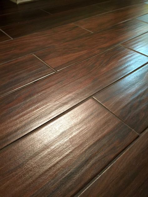 Guest Bathroom Flooring: Tile That Looks Like Hardwood Wood Look Floor Tiles Wide Plank, Ceramic Wood Tile Floor Living Room, Bathroom Flooring Tile, Wood Look Tile Bathroom, Tile Looks Like Wood, Wood Like Tile Flooring, Ceramic Wood Tile Floor, Kitchen Tile Floor, Brown Tile Bathroom