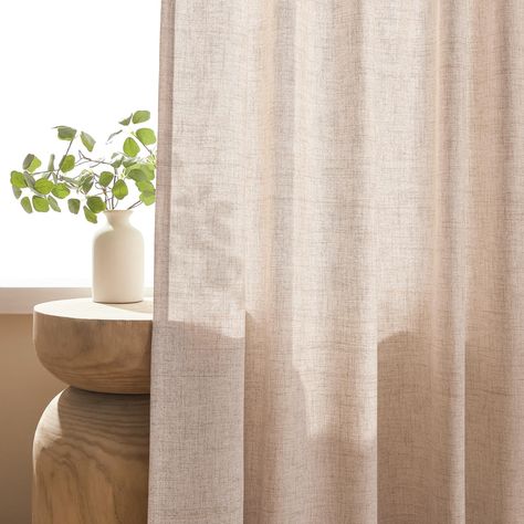 PRICES MAY VARY. BASIC INFORMATION: Package has 2 linen curtain panels, each 52 inch width by 63 inch length. 3 Hanging Options for different home style looks: 1) Using the back loops to hide the curtain rod and create an elegant pleated effect. 2) Using 3-inch pocket to create classic look. 3) Using the clip rings (not included) for easy sliding closure. Choose the hanging ways according to your preference. LIGHT FILTERING & PRIVACY: These neutral linen curtains will soften and filter the stron