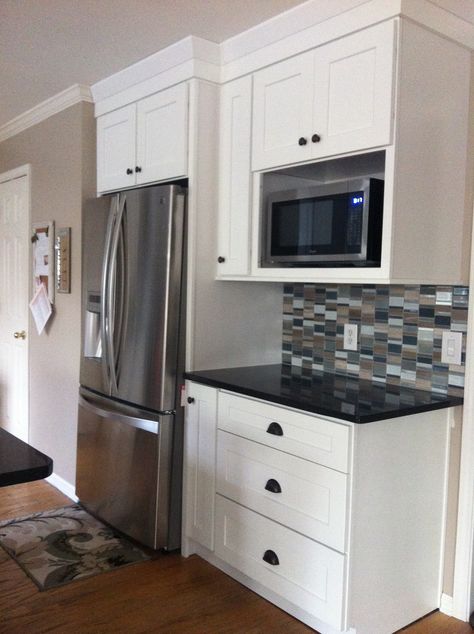 Microwave shelf and fridge. Add the pretty end scrolls under cabinet like in other pin. Black Quartz Kitchen Countertops, Kitchen Microwave Cabinet, Microwave Cabinet, Microwave Shelf, Microwave Drawer, Quartz Kitchen Countertops, Kabinet Dapur, Microwave In Kitchen, Small Remodel