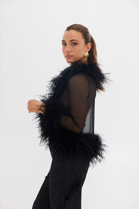 Embrace the allure of the feather detailing, ensuring you stand out this party season Feather Top Outfit, Feather Blouse, Safari Fashion, Feather Top, Ostrich Feather Trim, Spring Summer Wardrobe, Ostrich Feather, Ostrich Feathers, Fashion Event