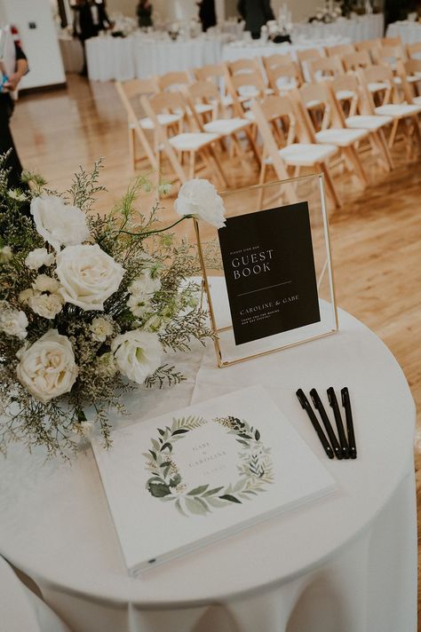 Black Tie Wedding with simple modern guest book table. #blacktiewedding #luxewedding #guestbook #guestbooktable #modernguestbooktable #guestbookideas #weddingreception #weddingdesign #modernweddingideas #modernweddinginspo #modernwedding #blackandwhitewedding #whiteflorals #whiteweddingflowers #weddinginspo #weddinginspiration Wedding Guest Book And Gift Table, Outdoor Wedding Guest Book Table, Card Guest Book Table, Simple Guest Table Wedding, Guest Book Display Table, Wedding Table Guest Book, Modern Wedding Gift Table, Guest Book Area Wedding, Wedding Side Table Ideas