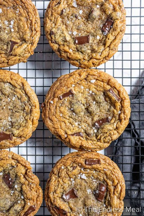 These brown butter sea salt chocolate chip cookies are worth hiding from the kids! Ok, or at least make a double batch so there's more than enough to go around. The crisp edges and buttery soft centers are what dreams cravings are made of. #theendlessmeal #cookies #brownbutter #chocolatechip #chocolate #dessert #chocolatedessert #holidaycookies #christmascookies #chocolatechipcookies #brownbuttercookies Ina Garten, Choclate Chip Cookie Recipe, Salted Chocolate Chip Cookies Recipes, Salt Cookies Recipe, Sea Salt Chocolate Chip Cookies, Salt Chocolate Chip Cookies, Buttery Chocolate Chip Cookies, Delicious Chocolate Chip Cookies, Salted Chocolate Chip Cookies